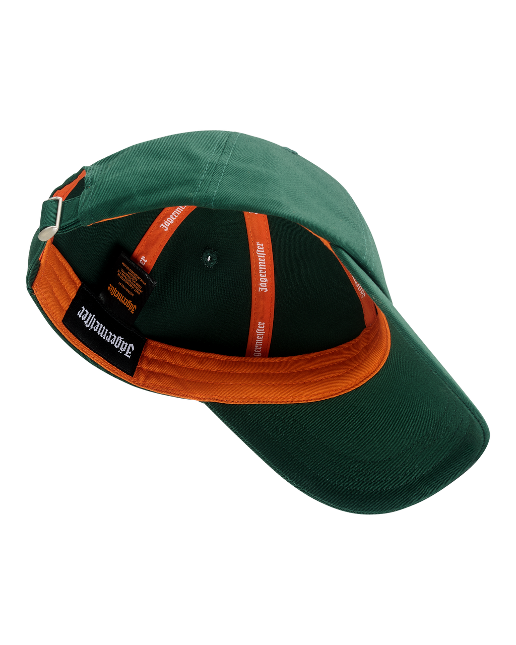Casquette de baseball Jägermeister verte avec un logo de marque visible à l’intérieur de la casquette.