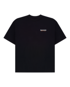 Black Jägermeister racing t-shirt with a small Jägermeister racing logo on the chest against.