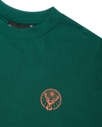 Green Jägermeister t-shirt with an orange logo on the chest.
